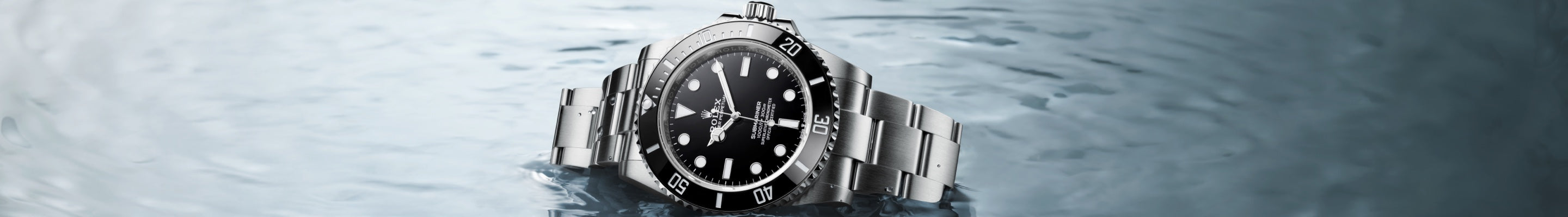 Rolex Submariner with Black Dial on Side in Water