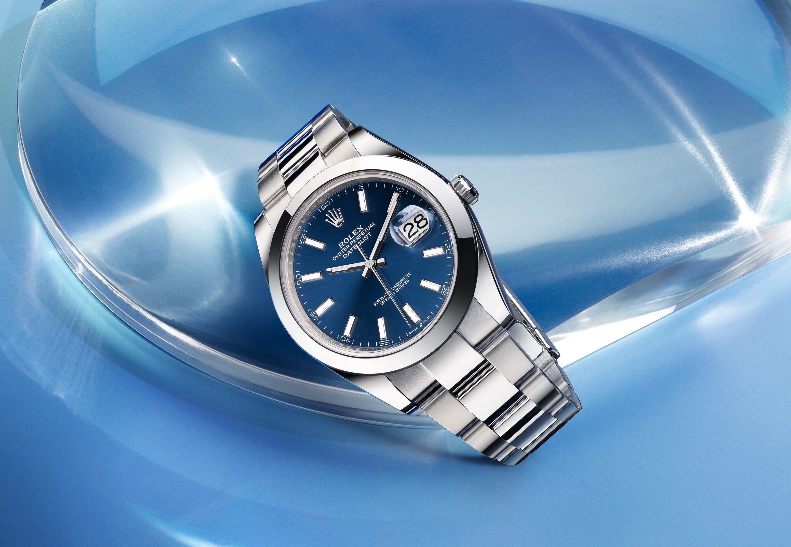 Rolex Datejust on Blue Background at Fink's Jewelers