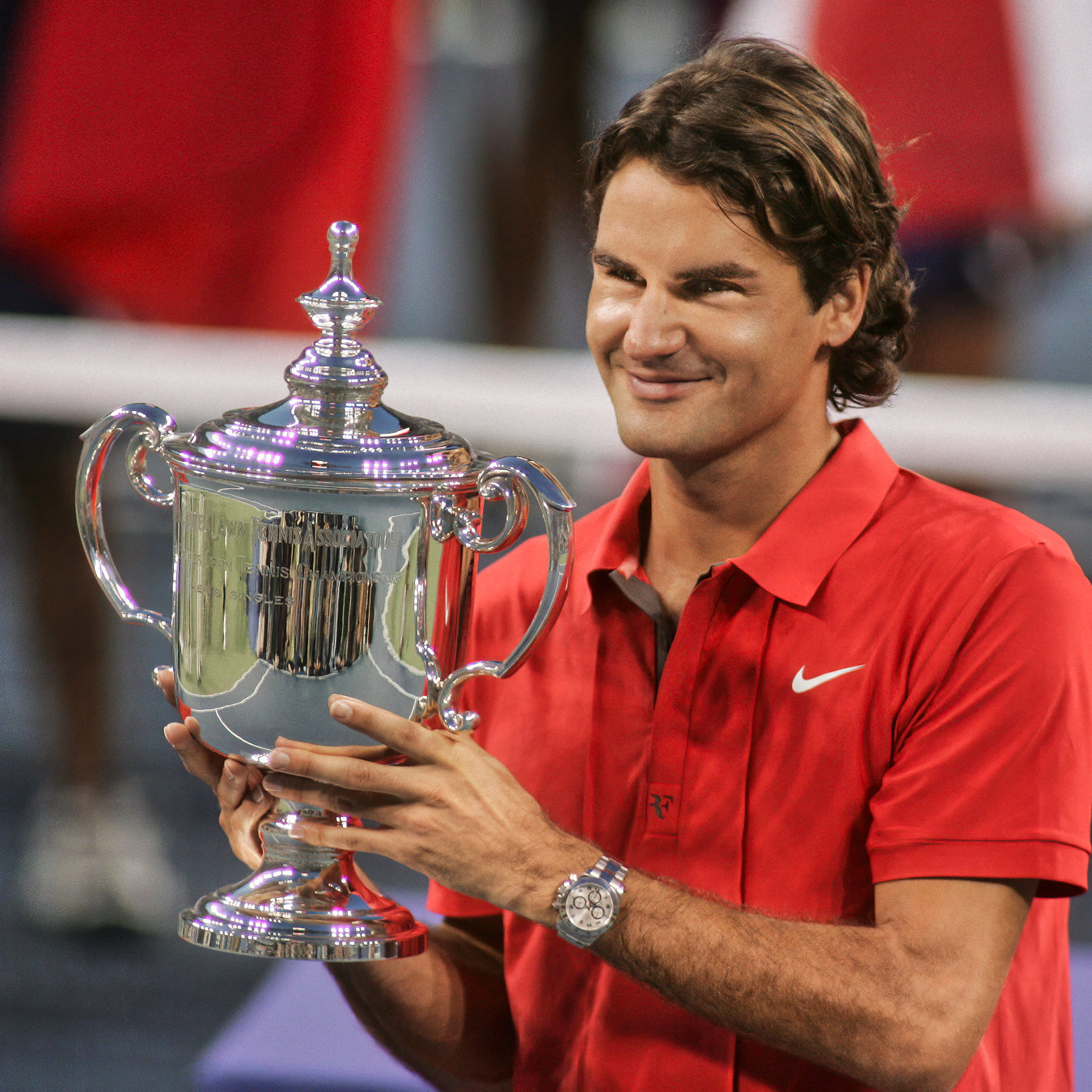 Rolex Testimonee Roger Federer with his US Open Trophy
