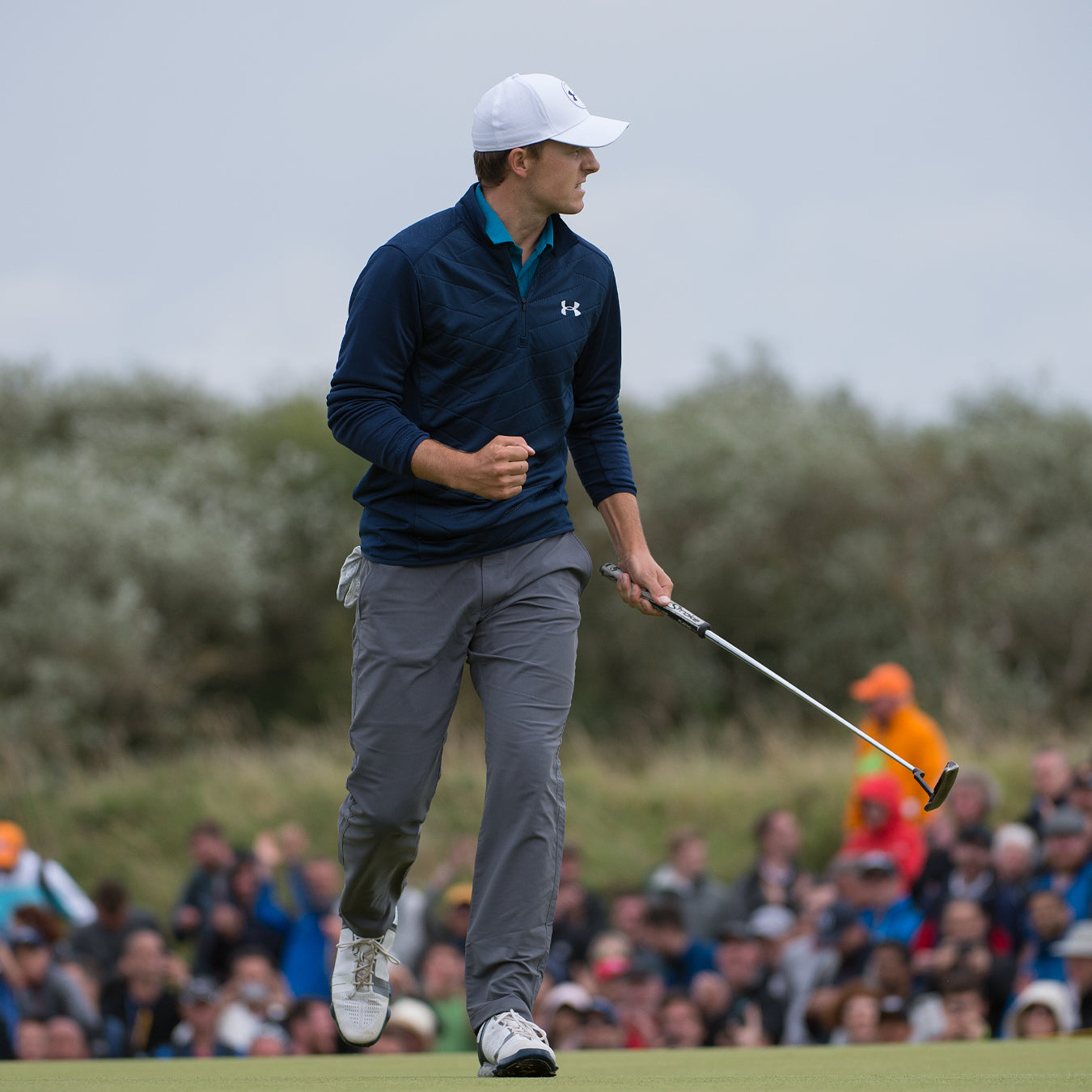 Jordan Spieth, a Rolex Testimonee, Celebrates During a Golf Tournament