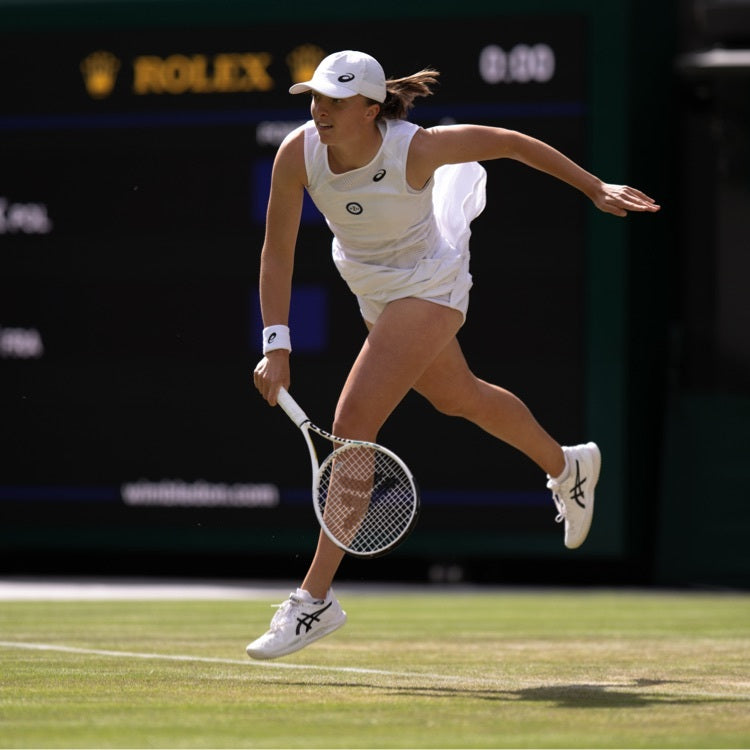 Rolex family member Iga Świątek Plays in a Tennis Match