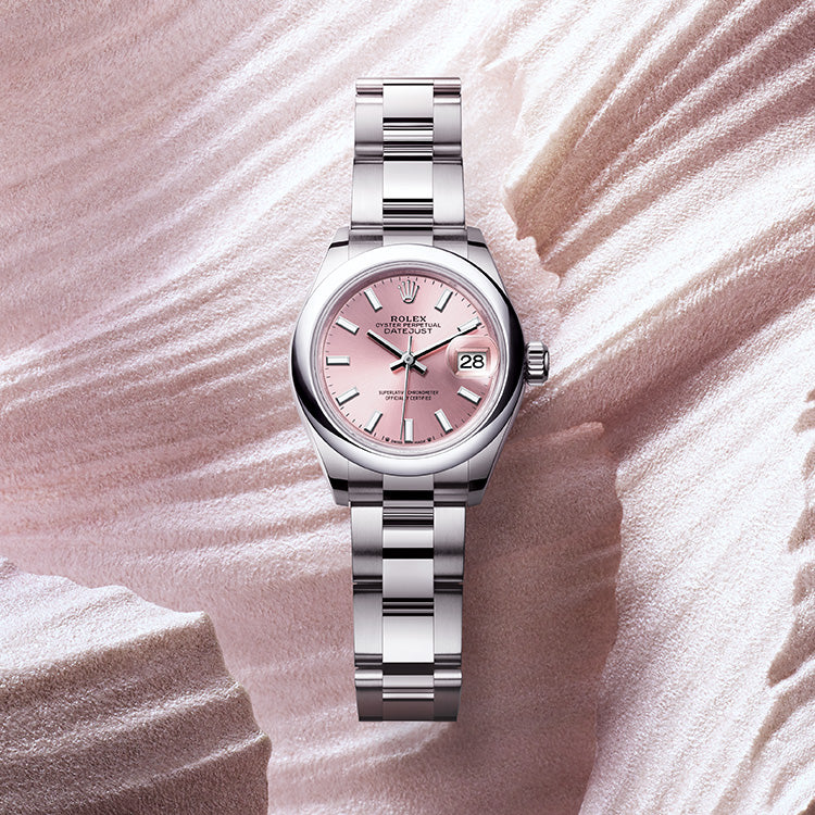 Rolex Lady-Datejust with Pink Dial at Fink's Jewelers in Pink Background