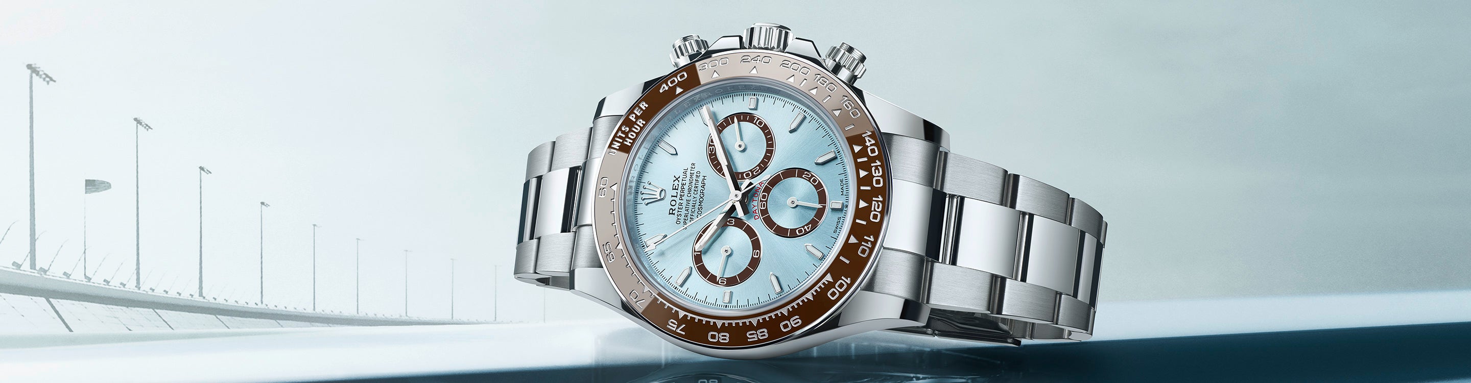 Rolex Cosmograph Daytona with Racetrack Background at Fink's Jewelers