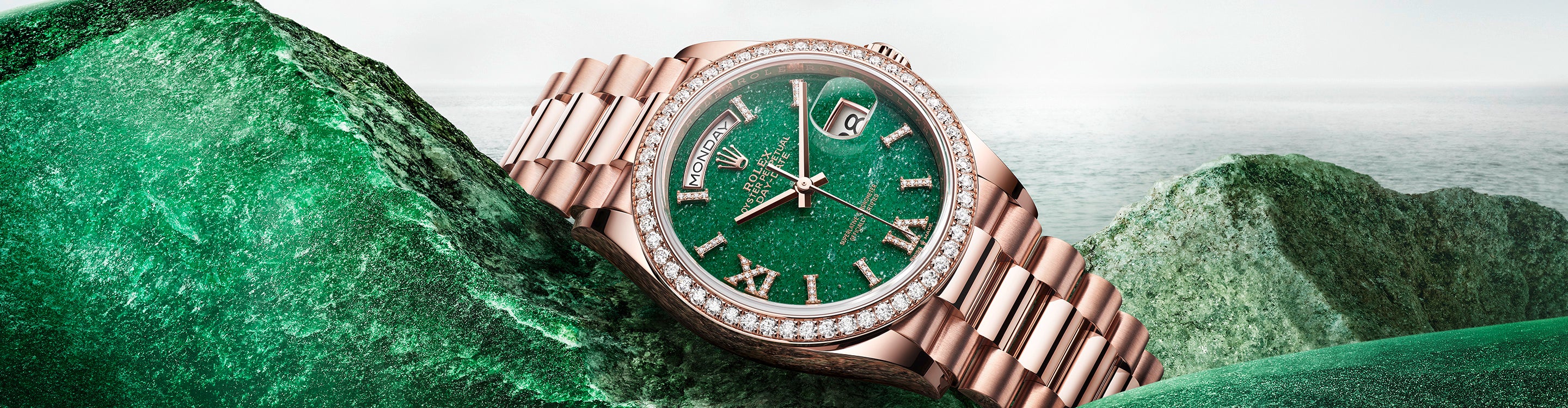 Rolex Day-Date on Emerald Rocks at Fink's Jewelers