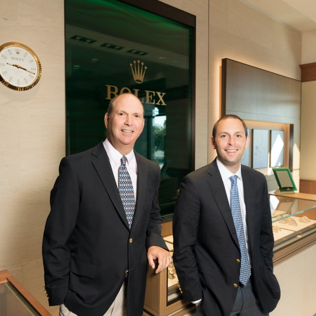 Fink's Jewelers owners Beside Rolex Counter