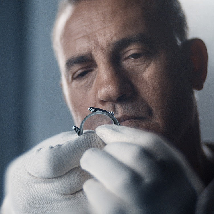 Rolex Watchmaker Inspecting a Case