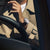 Man Wearing TAG Heuer Carrera Elegant Men's Calibre Heuer 02 Automatic Chronograph Silver Dial Watch with Leather Strap