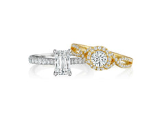 a yellow and white gold engagement ring and a white gold engagement ring on white background