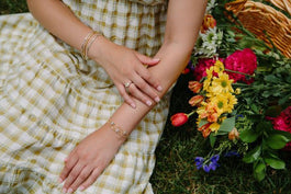 Model Wearing Designer jewelry for summer from Fink's Jewelers