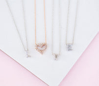 Personalized Initial Necklaces spelling the word "love"