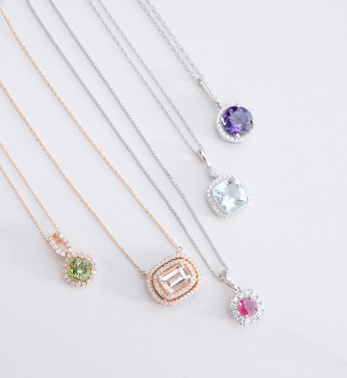 Five gemstone pendant necklaces from Fink's Jewelers