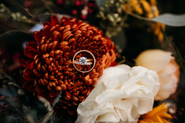 Wedding rings on bridal bouquet