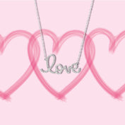Diamond "love" necklace in front of pink heart background