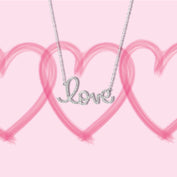 Diamond "love" necklace in front of pink heart background