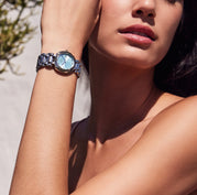 Woman Wearing Luxury Watch. Shop our vast selection of Ladies watches at Fink's Jewelers.