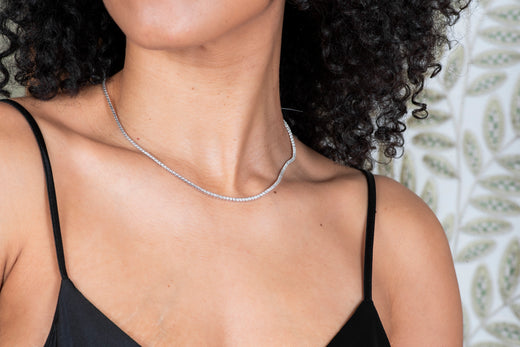Woman wearing diamond necklace