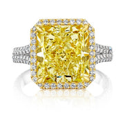 Engagement ring with yellow diamond center stone