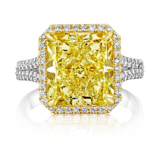 Engagement ring with yellow diamond center stone