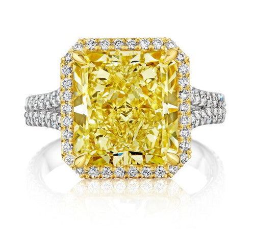 Engagement ring with yellow diamond center stone
