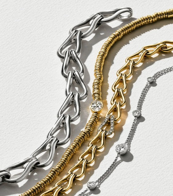 John Hardy sterling silver and yellow gold bracelets at Fink's Jewelers