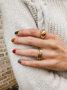 Woman wearing gold rings