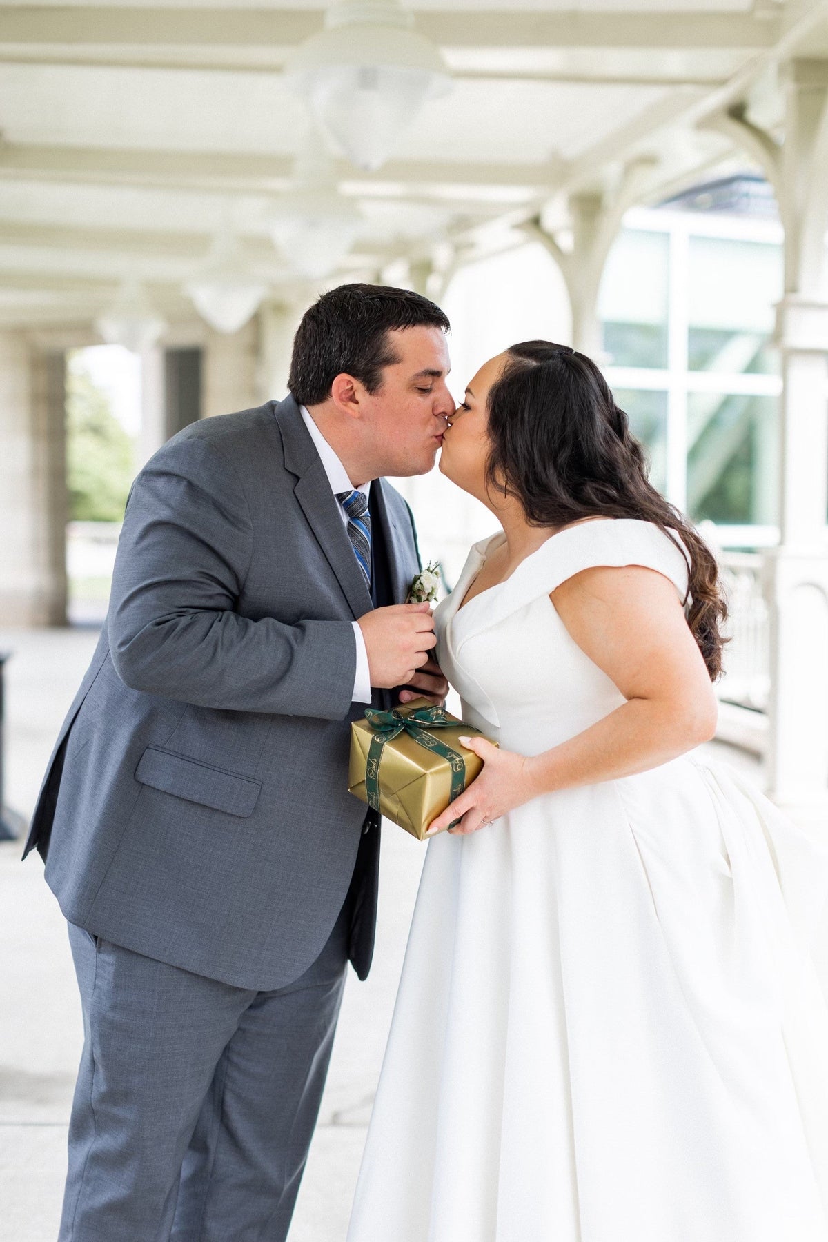 Bride Giving Her Groom a Gift from Fink's Jewelers