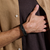 Man wearing John Hardy Icon 50 Sterling Silver and Black Leather Bracelet