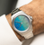 Model Wearing Oris ProPilot X Calibre 400 Laser Watch with Multicolored Dial