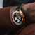 Model wearing Breitling Navitimer B01 Chronograph 43 Men&#39;s Watch with Black Dial