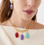 Woman wearing Marco Bicego Lunaria Yellow Gold Thulite Pendant with coordinating Gemstones