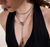 Woman Wearing John Hardy Naga Mixed Metals Diamond and Sapphire Lariat