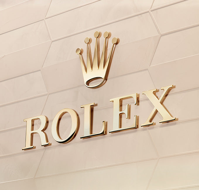 Rolex Gold Crown Logo on Wall