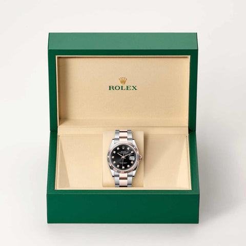Rolex Datejust watch in box
