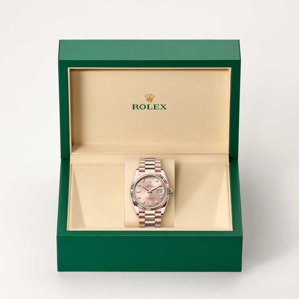 Rolex Day-Date watch in box