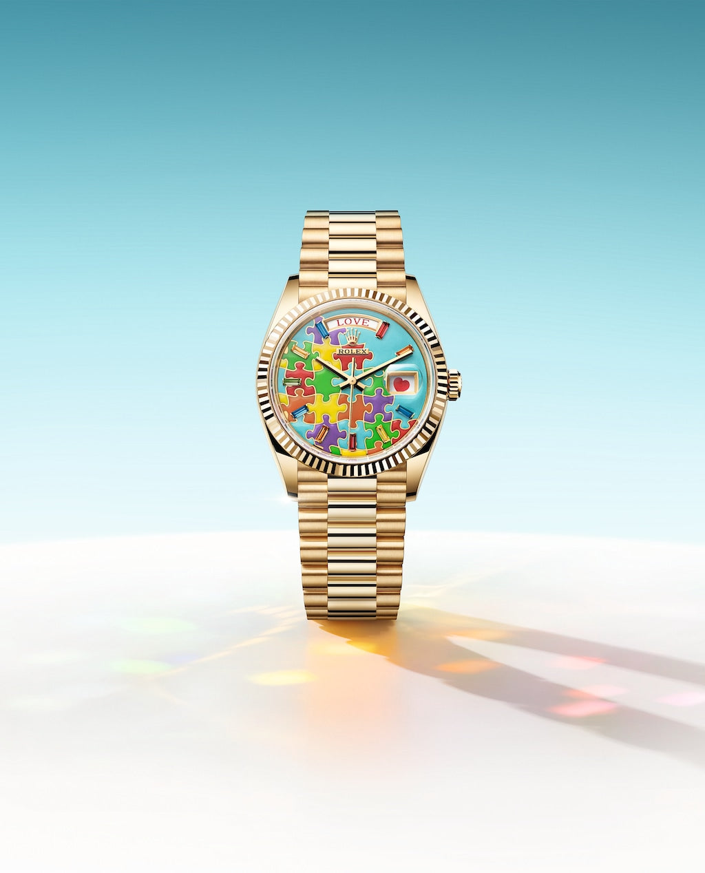 Rolex Day-Date 36 in Yellow Gold with Colorful Puzzle Motif and Love Date Message
