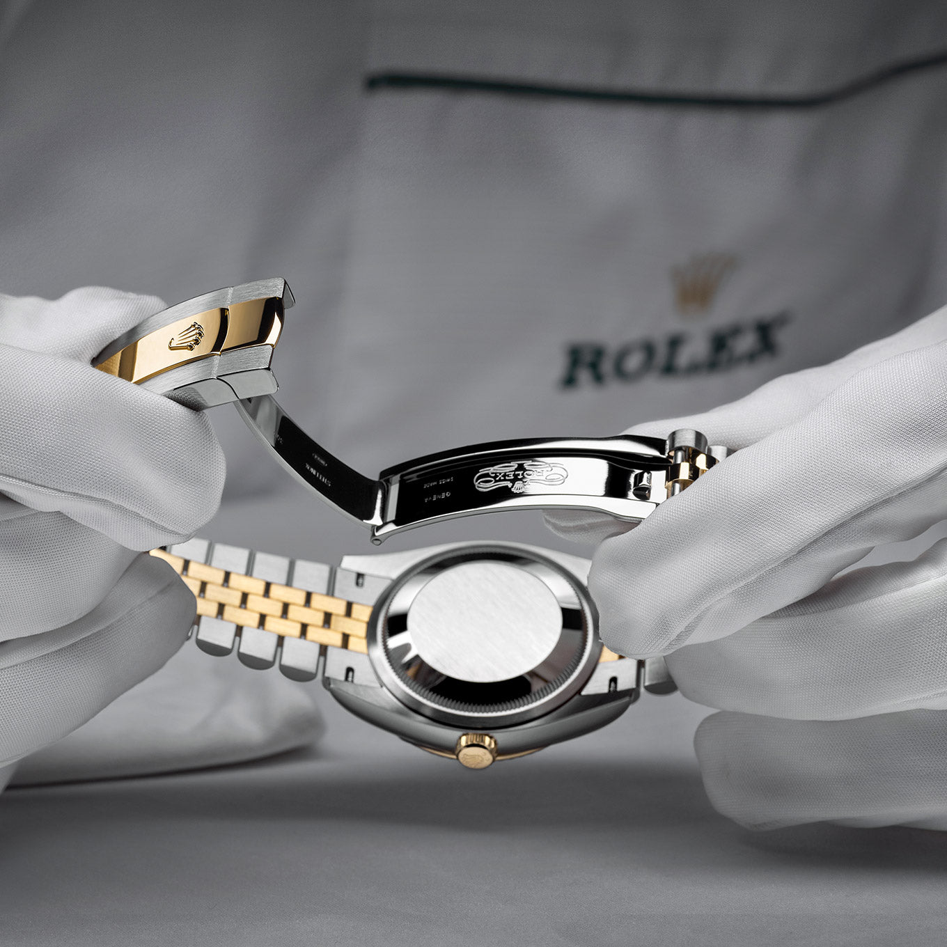 Inspecting Watch Clasp During Rolex Servicing at Fink's Jewelers