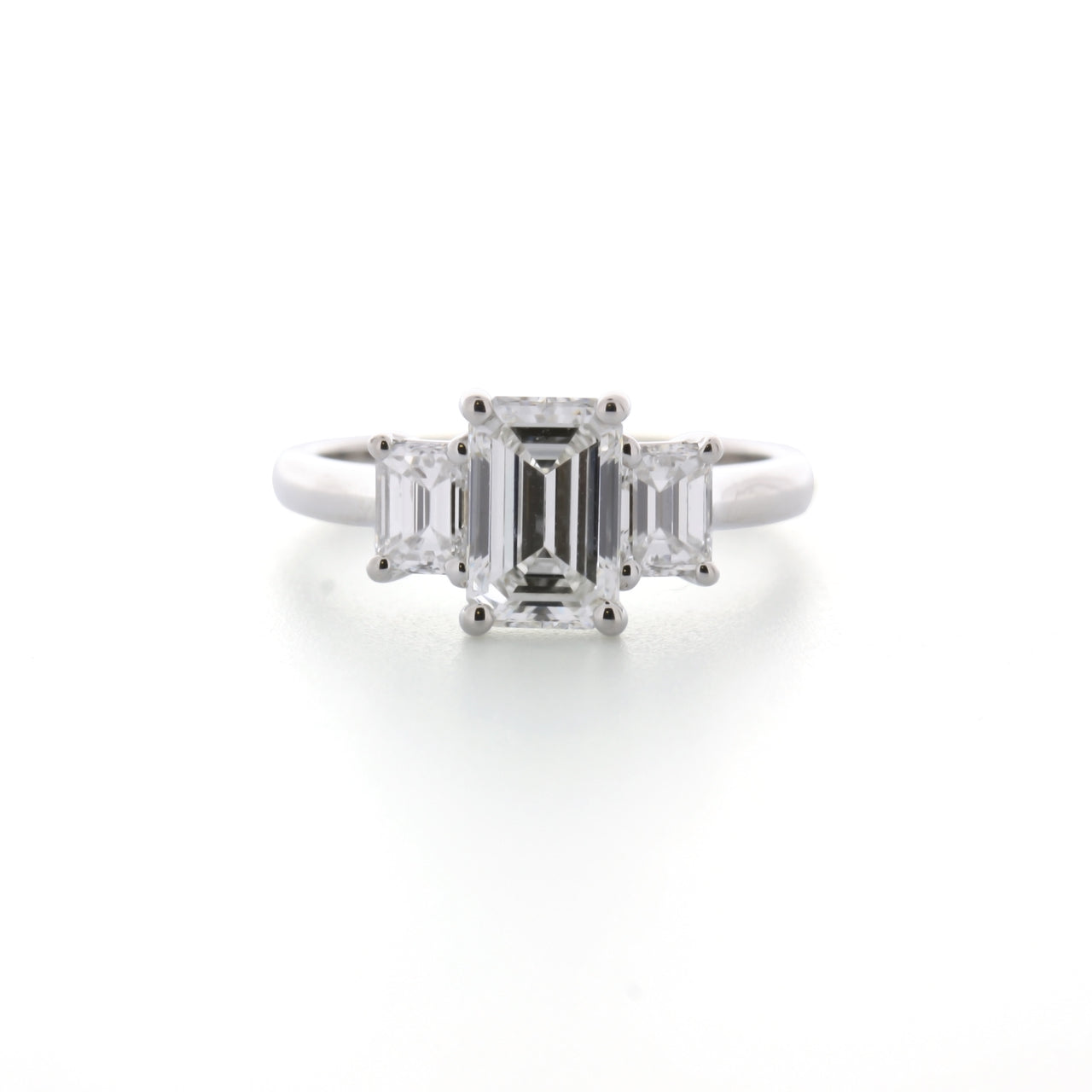 Fink's Exclusive Platinum Emerald Cut Diamond Three Stone Engagement Ring