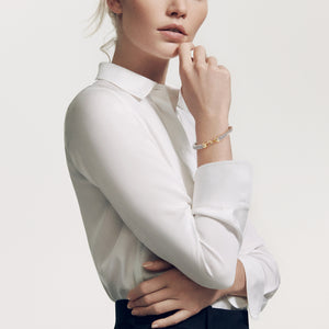 Model Wearing David Yurman Sterling Silver Cable Bracelet with Gold Hook Clasp