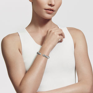 Woman Wearing David Yurman Sculpted Cable Cuff Bracelet with Pavé Diamonds