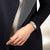 Woman Wearing Longines Round Case Stainless Steel White Arabic Dial Watch