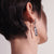 Load image into Gallery viewer, John Hardy Chain Silver J Initial Pendant Earrings on Model